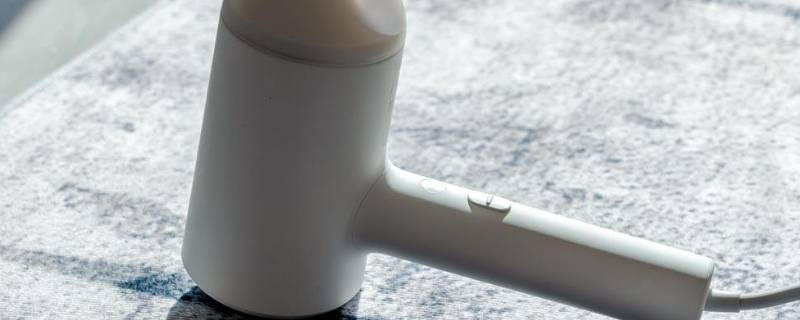 羽绒服能用吹风机吹干吗